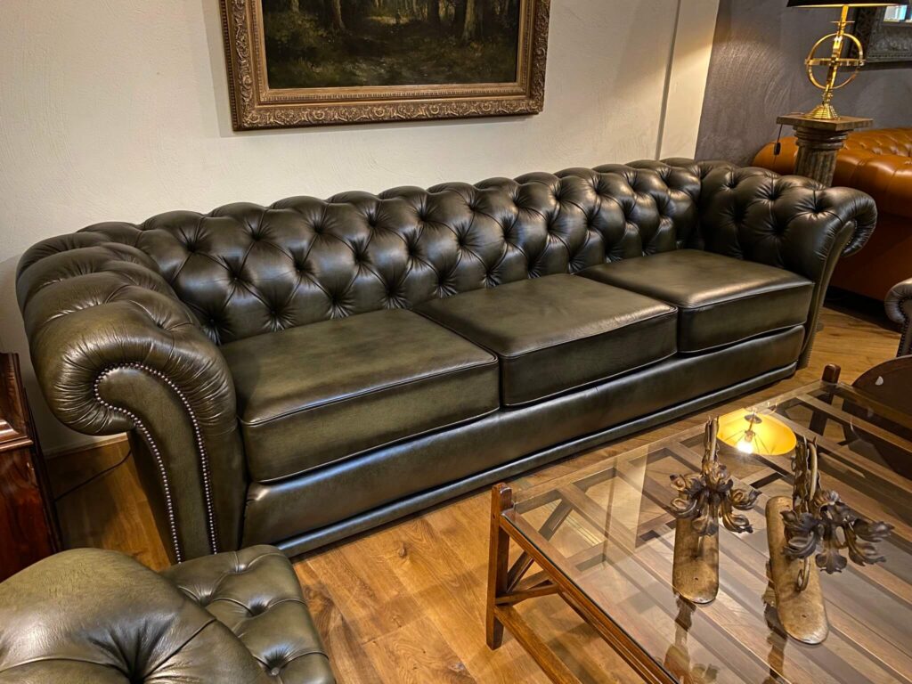 chesterfield showroom model four seater in olive green
